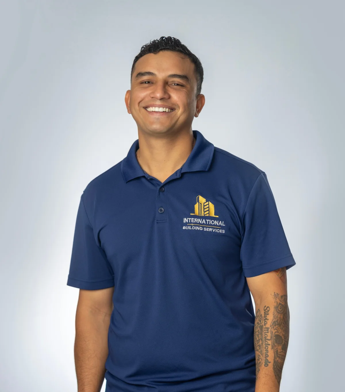 IBS employee headshot on a studio backdrop