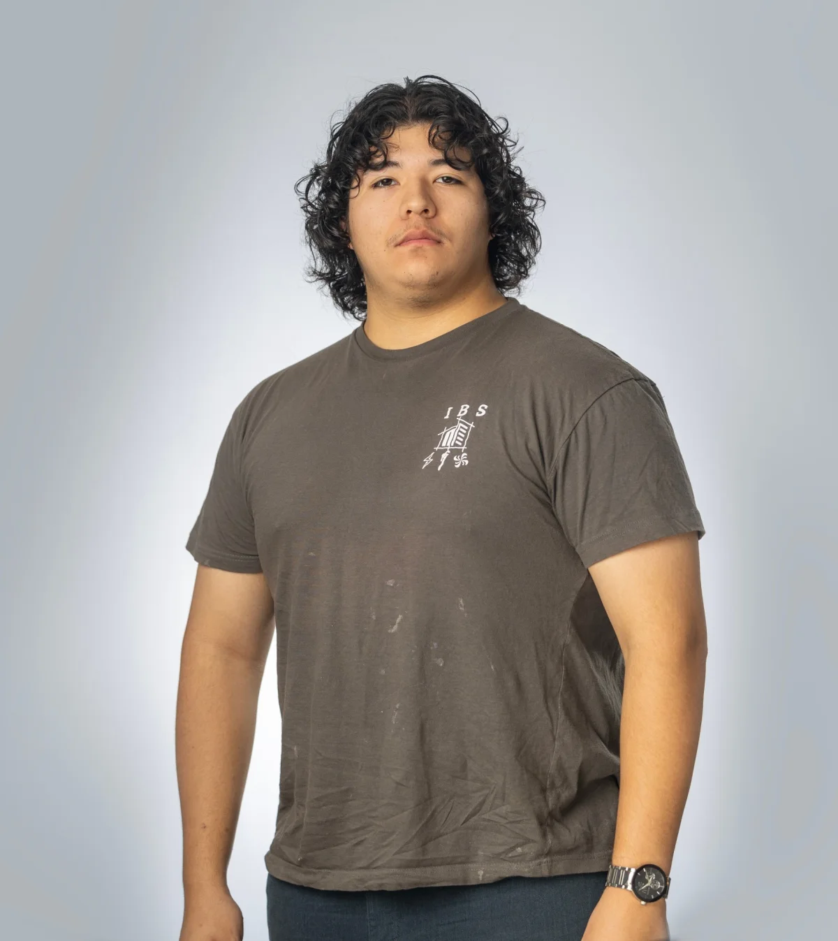 IBS employee headshot on a studio backdrop