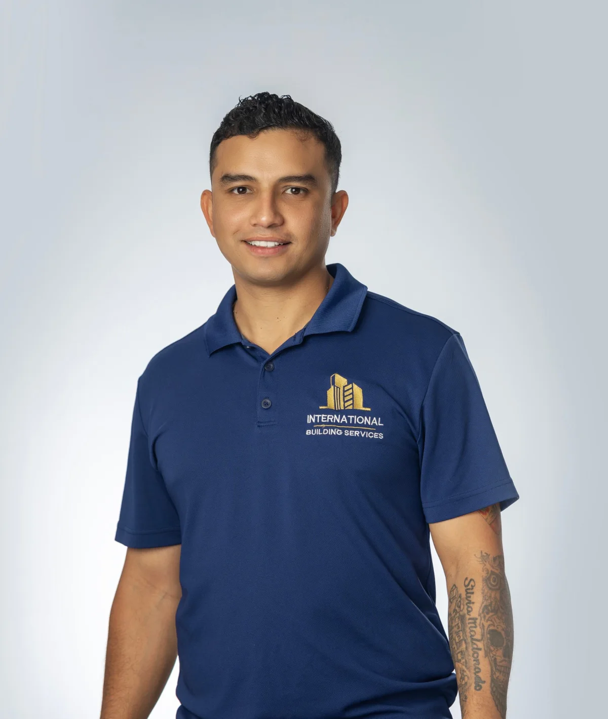 IBS employee headshot on a studio backdrop