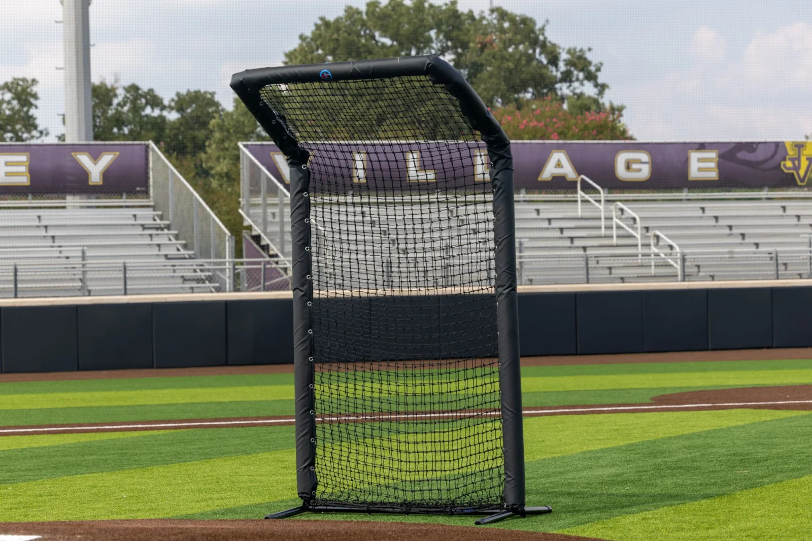 L-screen staged in front of stadium seating and outfield signage