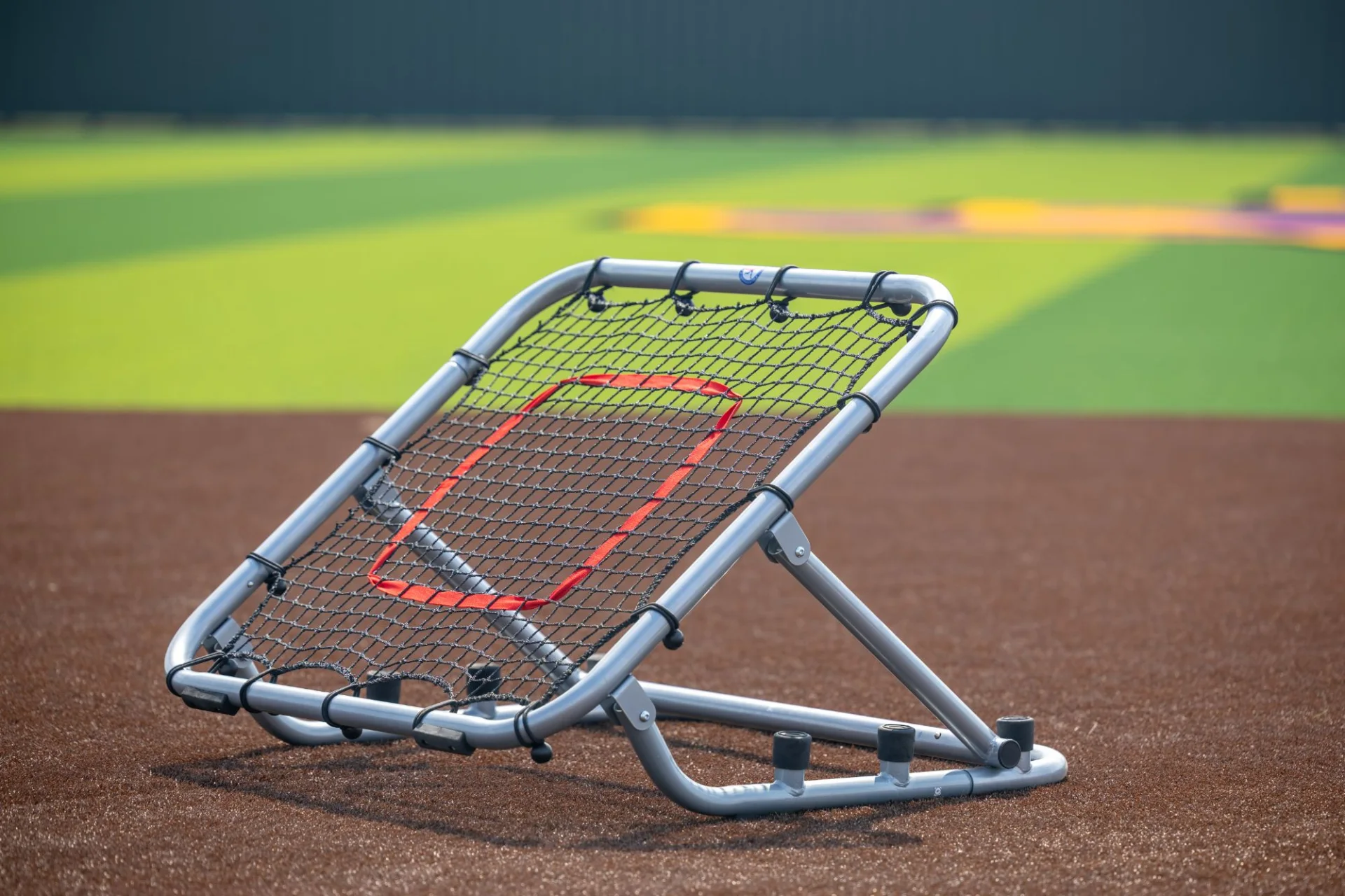 Rebounder training tool photographed on the infield